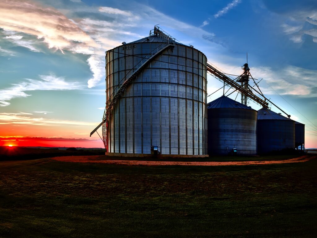 Grain silos against a stunning sunset