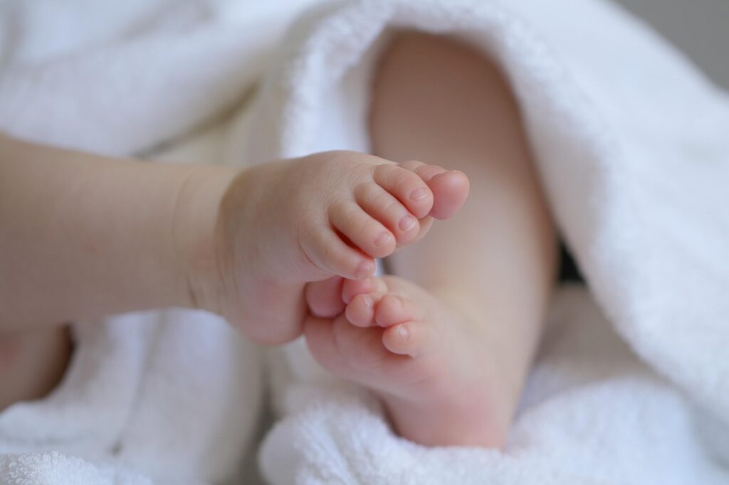 Baby feet swaddled in blanket - is this one welcome here?
