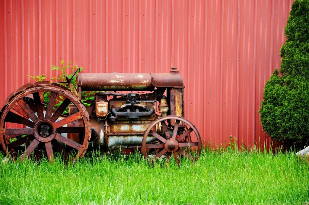 Farming - antique tractor outside the barn