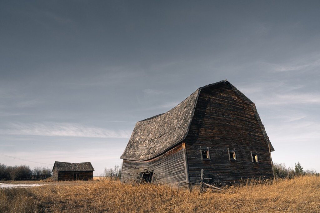 Old barn under dark skies