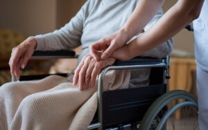 Nursing home patient in wheelchair